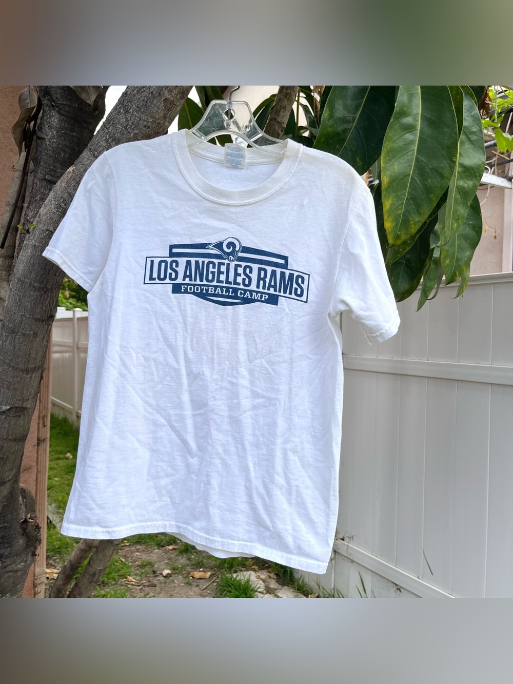 Los Angeles Rams Football Camp Baby Tee in White .